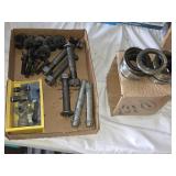 Lot of Trailer Parts Including Wheel Seals, Bolts, and Valves