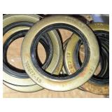 Lot of Trailer Parts Including Wheel Seals, Bolts, and Valves