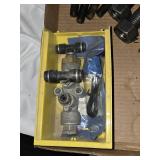 Lot of Trailer Parts Including Wheel Seals, Bolts, and Valves