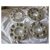 Wheel spacers including One @ 5x114.3-5x120.65 and Three @ 5-4.75/5-4.75 patterns, aluminum construction with bolt-on design.