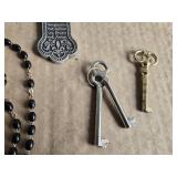 Rosaries, Cross Pendant, and Keys