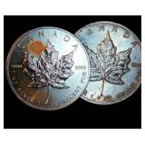 (2) 1 oz Silver Maple Leafs, cull