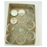 variety of canning jars and lids. pint and half pint