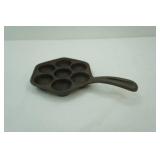 cast iron Aebleskiver pan.