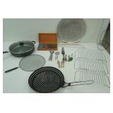 Kitchenware Lot: Teflon Frying pan w/lid and grease screen, pizza pan, steak knives, cooling racks and more