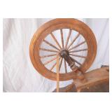 antique wooden spinning wheel