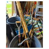 Garbage Can Full of Good Yard Tools Shovels etc