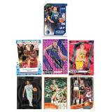 Lot Of 7 Basketball Cards Including 1989-90 Fleer Sticker #2 Akeem Olajuwon, 2024 Panini Select Stephon Castle Concourse Rookie Card #72, and More!