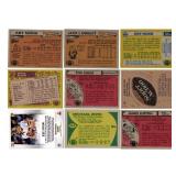 Lot Of 9 Football Cards Including 1989 Topps Michael Irvin #383 Rookie Card, 1980 Topps #225 Phill Simms Rookie Card, and More!
