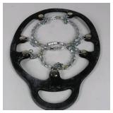 Yaktrax Diamond Grip black XL ice traction cleats with metal coil traction. Hillsound bucket seat bag and Yaktrax packaging shown.