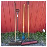 Lot of Assorted Brooms, Shovel, and Long Handle Yard Tools