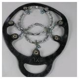 Yaktrax Diamond Grip black XL ice traction cleats with metal coil traction. Hillsound bucket seat bag and Yaktrax packaging shown.