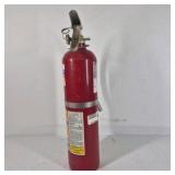 Red Fire Extinguisher with Hose and Nozzle