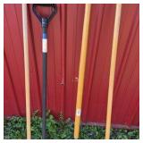 Lot of Assorted Brooms, Shovel, and Long Handle Yard Tools