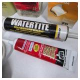 Assorted Household Hardware Electrical Supplies and Caulk Lot