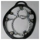 Yaktrax Diamond Grip black XL ice traction cleats with metal coil traction. Hillsound bucket seat bag and Yaktrax packaging shown.