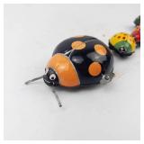 Vintage Tps Japan Tin Wind-Up Ladybug Family Toys (Lot of 4)