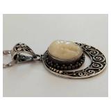 Sterling Silver Carved Moon Face Necklace