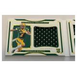 Christian Watson RPA Booklet /99 - Auto, Dual Relic, Rookie, Numbered 85/99 - 2022 National Treasures #SB-CWA Football Card