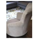Beige Textured Upholstered Swivel Accent Chair
