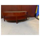 Mahogany Oval Coffee Table 42" X 25 1/4" X 16 with Glass Top and Lower Shelf