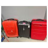 Large Rolling Suitcases: Two Samsonite, One Delsey.  Large Red Samsonite missing front wheel.  30" x 20" x 12", 30" X 20" x 13", 26" x 17" x 11"