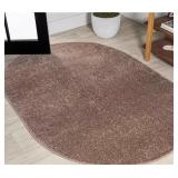 Haze Solid Low-Pile Brown 5 ft. x 8 ft. Oval Area Rug