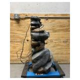 ^ Outdoor Cascading Water Fountain with Natural Looking Stone Waterfall