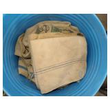 Metal Barrel with Canvas and Feed Sacks with Markings