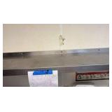 Industrial stainless steel solid wall shelf 66” L