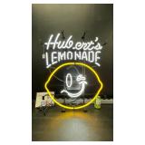 Huberts Lemonade neon sign with smiley lemon