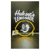 Huberts Lemonade neon sign with smiley lemon