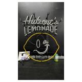 Huberts Lemonade neon sign with smiley lemon