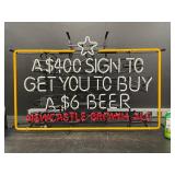 Newcastle Brown Ale neon sign: "A$400 sign to sell a $6 Beer", NOS