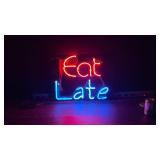 "Eat Late" neon on black plexi background