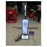 Hoover cordless vacuum with 2 batteries & charger. New condition. But will not power up. As shown.