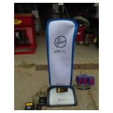 Hoover cordless vacuum with 2 batteries & charger. New condition. But will not power up. As shown.