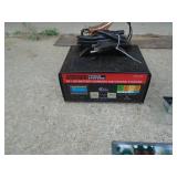 Battery charger & automotive signs. As shown.