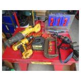 2 Dewalt tools & charger with misc tools. As shown.