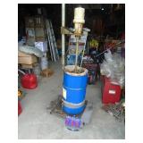 Graco grease pump & 30 gallon tub of grease half full. As shown.
