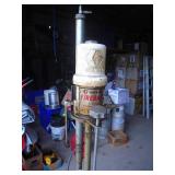 Graco grease pump & 30 gallon tub of grease half full. As shown.