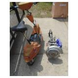 Champion outboard vintage Champion outboard motor & electric scooter. As shown.