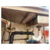 Left side drain board;  right-side rinse sink and sprayer