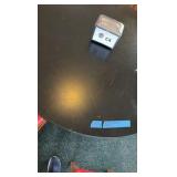 (1) 54" Round Table, 5 Chairs + Napkin Dispenser