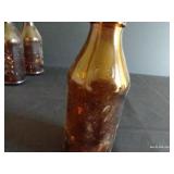 (9) Certo Amber Medication Bottles w/ Calibration Marks Upside Down
