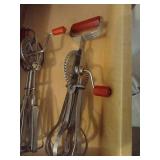 Two Vintage Egg Beaters with Red Handles