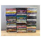 100 DVD Movie Collection - The West Wing, The Carol Burnett Show, Gremlins, Elf, Sex and the City, Watchmen, Burn Notice, Happy Feet, Ice Age, The Lord of the Rings *C
