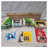 Lot of Die Cast Tractors in Packages as shown