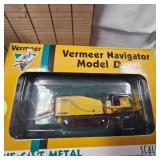 Lot of Die Cast Tractors in Packages as shown