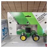 Lot of Die Cast Tractors in Packages as shown